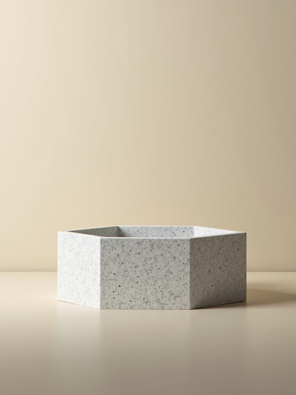 Speckled quartz bowl on a smooth neutral surface